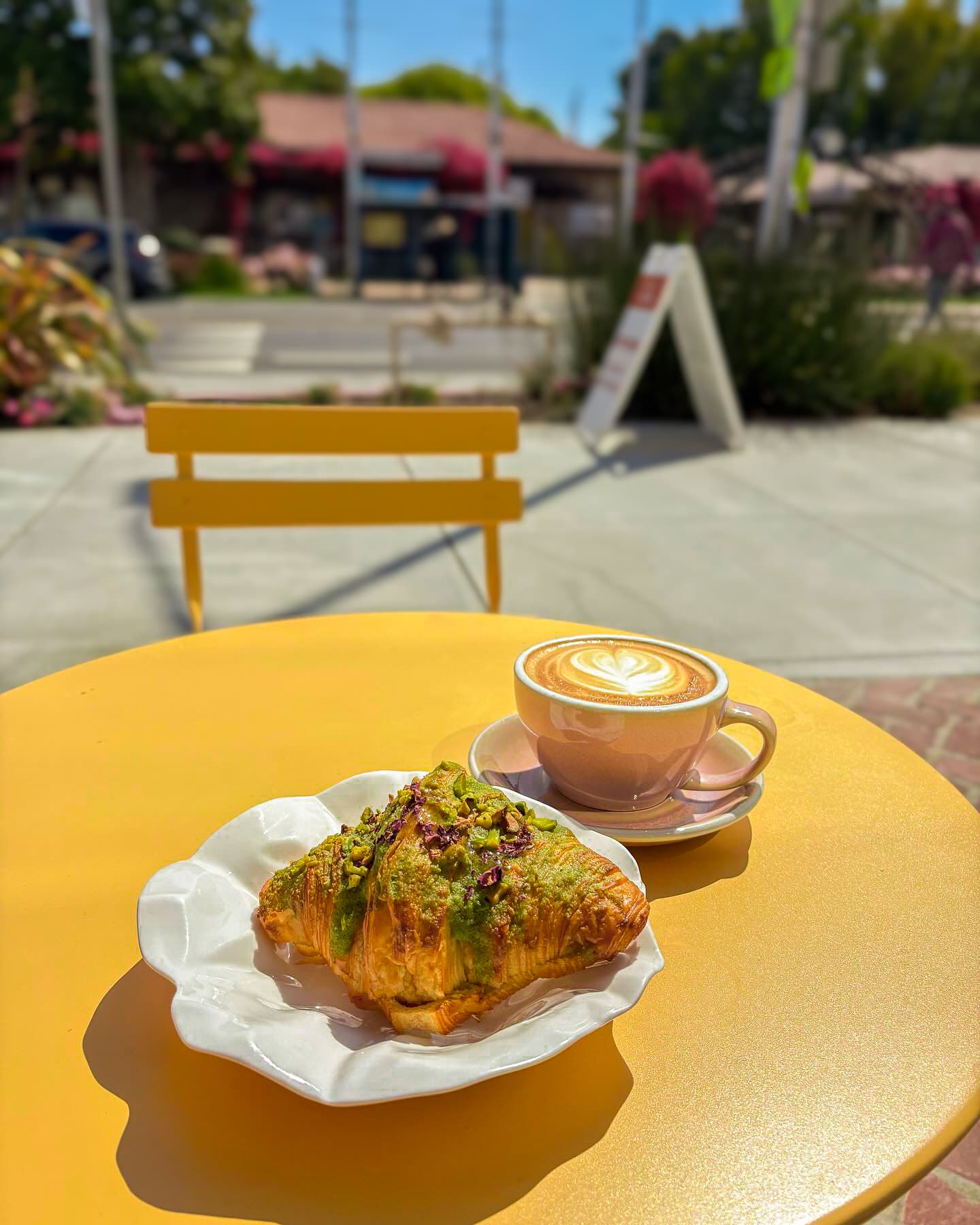 Coffee and a pastry on the café patio