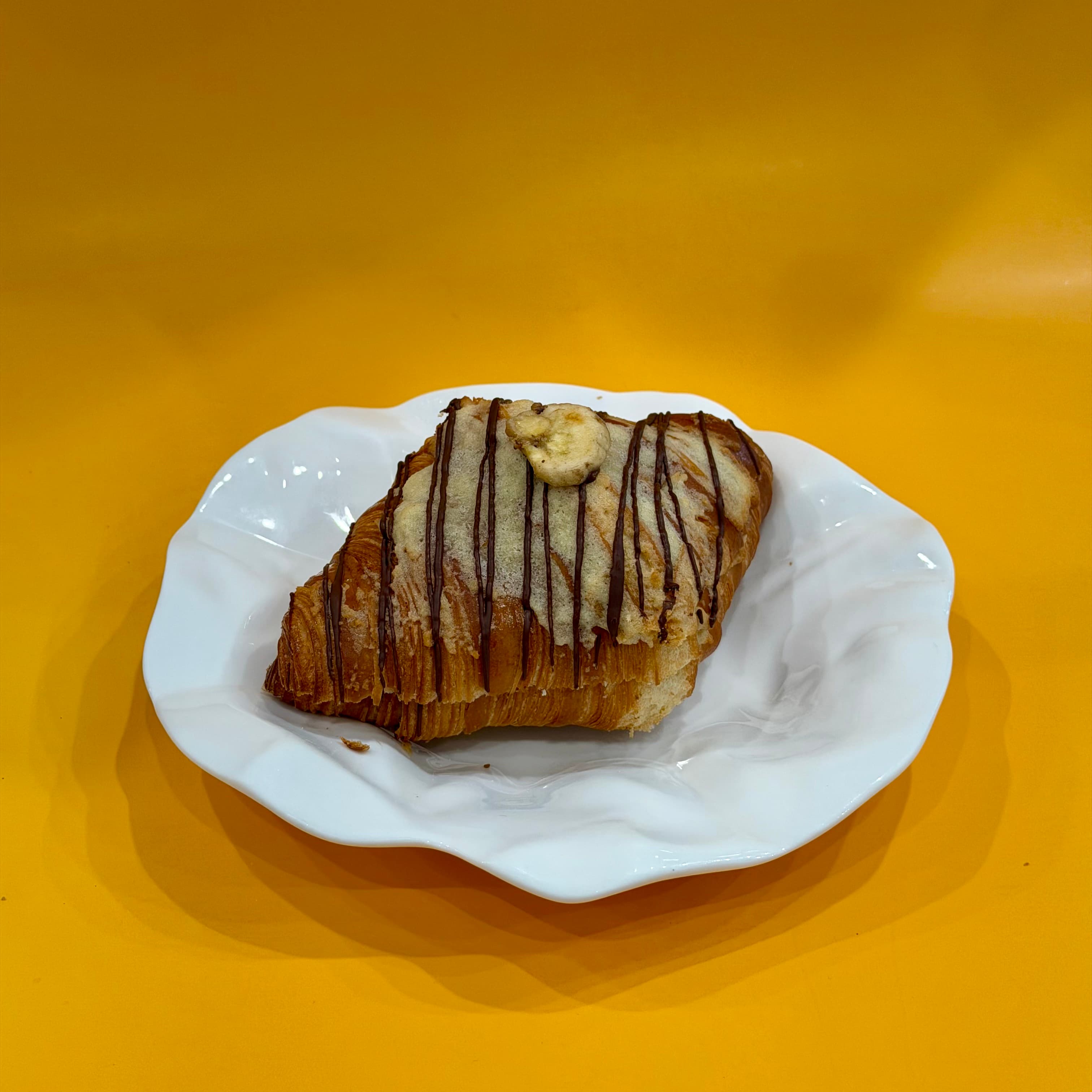 Chocolate Banana Croissant - Croissant with a chocolate and banana filling.